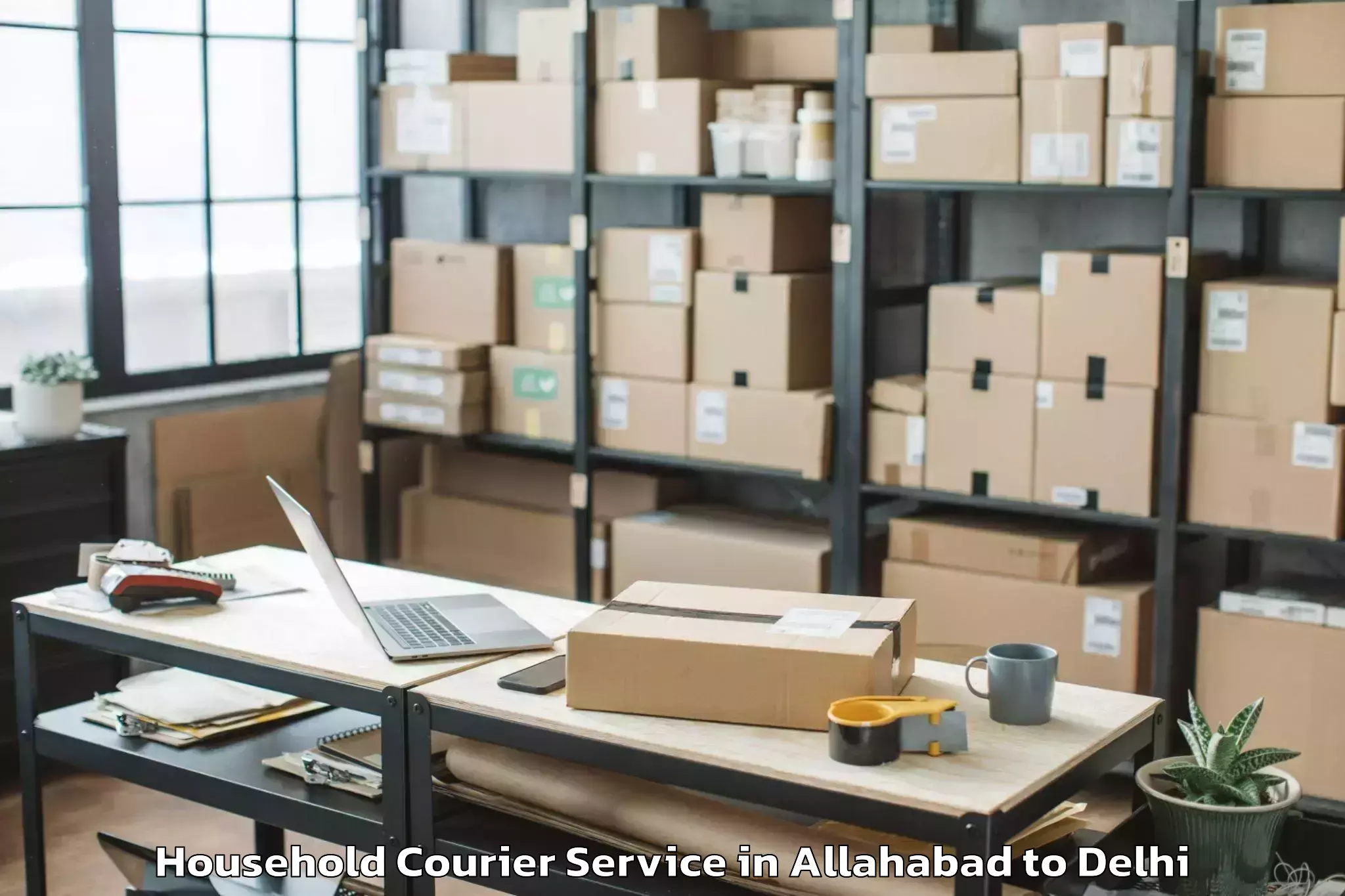 Reliable Allahabad to Ambience Mall Rohini Household Courier